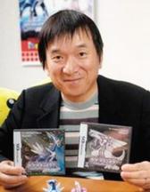 Picture of Satoshi Tajiri holding up Pokemon games