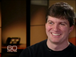 Picture of Michael Burry smiling in a 60 minutes interview